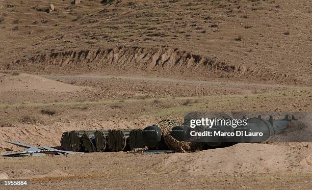 Containers holding high explosives sit at a site suspected of housing chemical weapons April 28, 2003 after being discovered by U.S. Troops in the...