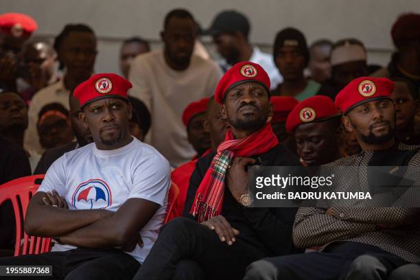 Ugandan musician-turned-politician Robert Kyagulanyi, also known as Bobi Wine , reacts during a public screening of the documentary 'Bobi Wine: The...
