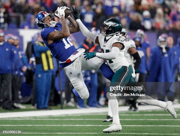 Darren Waller of the New York Giants hauls in a reception against James Bradberry of the Philadelphia Eagles at MetLife Stadium on January 07, 2024...