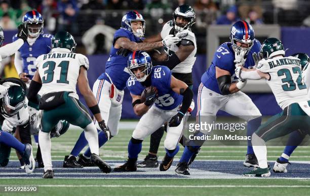 Saquon Barkley of the New York Giants in action against the Philadelphia Eagles at MetLife Stadium on January 07, 2024 in East Rutherford, New...