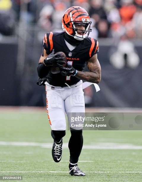 Ja'Marr Chase of the Cincinnati Bengals runs with the ball against the Cleveland Browns at Paycor Stadium on January 07, 2024 in Cincinnati, Ohio.