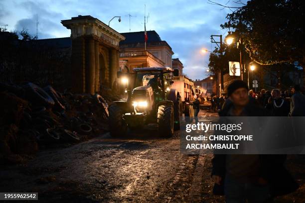 Farmers of the CR47 union dump slurry, manure, tyres and debris at the entrance to the prefecture in Agen, southwestern France, on January 26...