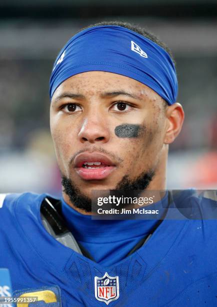 Saquon Barkley of the New York Giants looks on against the Philadelphia Eagles at MetLife Stadium on January 07, 2024 in East Rutherford, New Jersey....