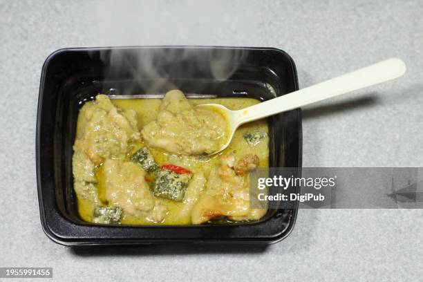 thai green curry takeout - aromatic and ready to eat - green curry stock pictures, royalty-free photos & images