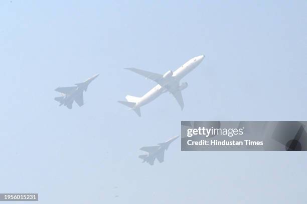 Indian Air Force's P-8i Aircraft along with Sukhoi Su-30 jets fly past in Varuna Formation during the 75th Republic Day Parade 2024 at Kartavya Path...