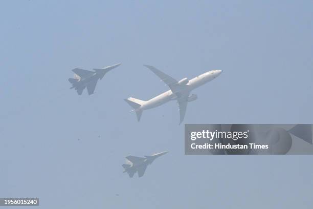 Indian Air Force's P-8i Aircraft along with Sukhoi Su-30 jets fly past in Varuna Formation during the 75th Republic Day Parade 2024 at Kartavya Path...