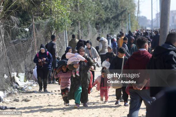 Palestinians leave their homes and migrate to safe areas with their belongings due to the Israeli attacks in Khan Yunis, Gaza on January 26, 2024....