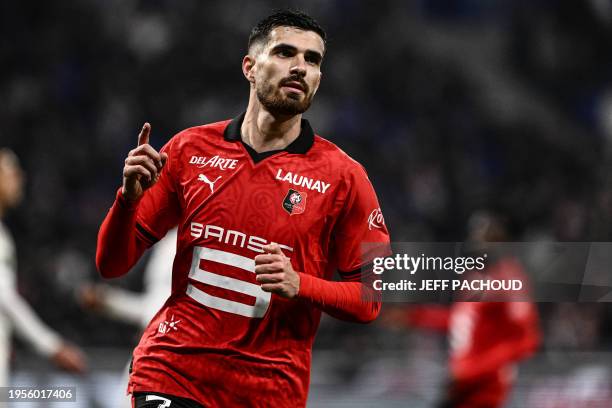 Rennes' French forward Martin Terrier celebrates after scoring a goal during the French L1 football match between Olympique Lyonnais and Stade...