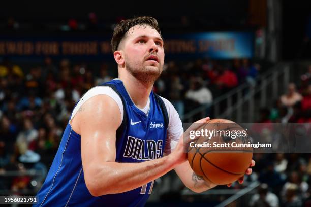 Luka Doncic of the Dallas Mavericks shoots a free throw during the game against the Atlanta Hawks on January 26, 2024 at State Farm Arena in Atlanta,...