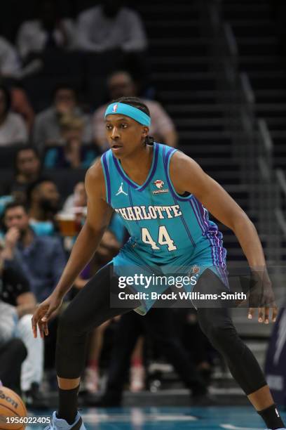 Frank Ntilinkina of the Charlotte Hornets plays defense during the game against the Houston Rockets on January 26, 2024 at Spectrum Center in...