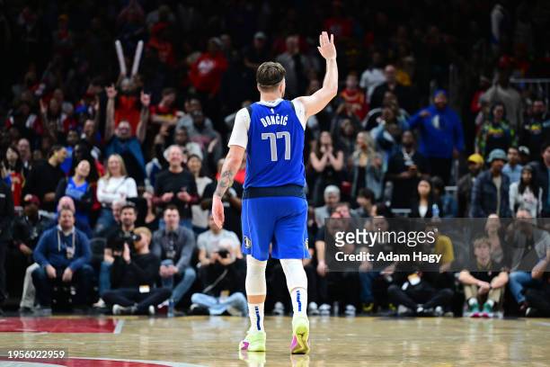 Luka Doncic of the Dallas Mavericks waves to fans during the game against the Atlanta Hawks on January 26, 2024 at State Farm Arena in Atlanta,...