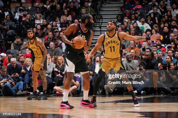 Bruce Brown of the Toronto Raptors plays defense against James Harden of the LA Clippers during the game on January 26, 2024 at the Scotiabank Arena...