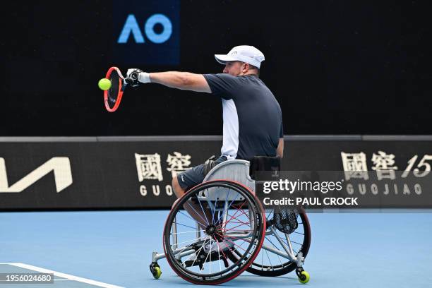 Netherlands' Sam Schroder hits a return against Israel's Guy Sasson during their men's quad wheelchair singles final match on day 14 of the...