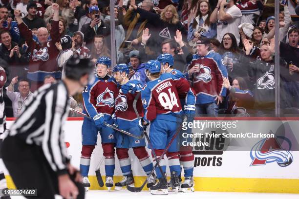 The Colorado Avalanche celebrate after Josh Manson scored the team's fourth goal on the Los Angeles Kings in the second period at Ball Arena on...