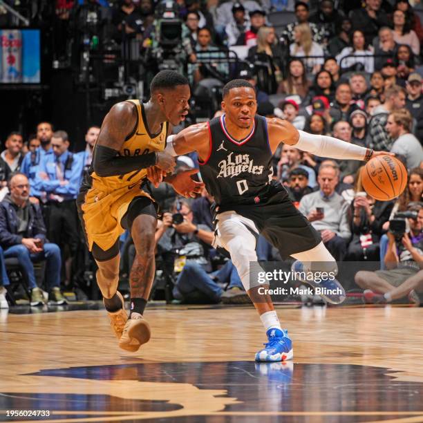 Russell Westbrook of the LA Clippers dribbles the ball during the game against the Toronto Raptors on January 26, 2024 at the Scotiabank Arena in...