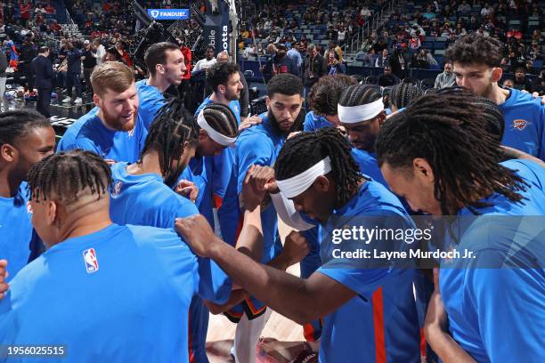 The Oklahoma City Thunder huddle before the game against the New Orleans Pelicans on January 26, 2024 at the Smoothie King Center in New Orleans,...