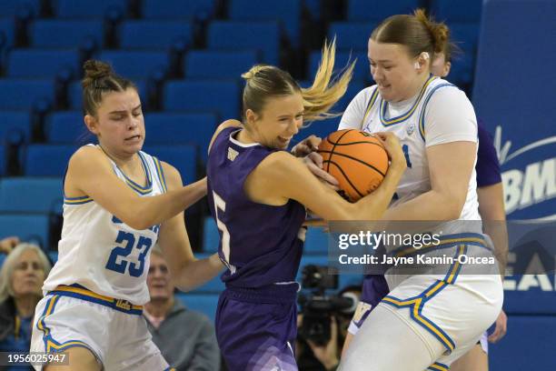 Gabriela Jaquez and Lina Sontag of the UCLA Bruins battle Teagan Brown of the Washington Huskies for a rebound in the first half at UCLA Pauley...