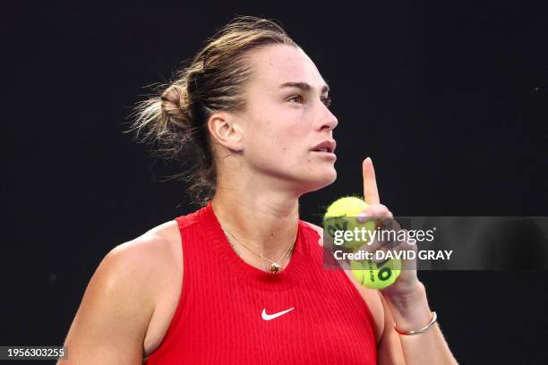 Belarus' Aryna Sabalenka prepares to play a point against China's Zheng Qinwen during their women's singles final match on day 14 of the Australian...