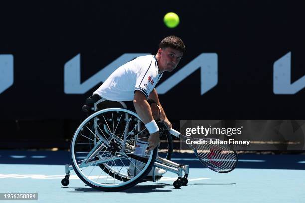 Gordon Reid of the United Kingdom plays a shot in their quarterfinal wheelchair singles match against Tom Egberink of Netherlands during the 2024...