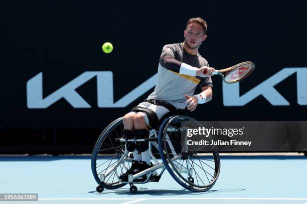 Alfie Hewett of the United Kingdom plays a shot in their quarterfinals wheelchair singles match against Alexander Cataldo of Chile during the 2024...