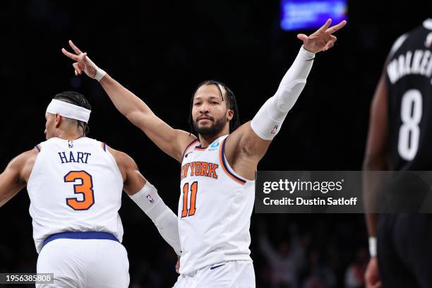 Jalen Brunson of the New York Knicks reacts after making a three pointer during the fourth quarter of the game against the Brooklyn Nets at Barclays...