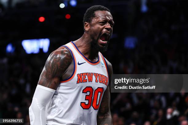 Julius Randle of the New York Knicks reacts after a dunk during the fourth quarter of the game against the Brooklyn Nets at Barclays Center on...