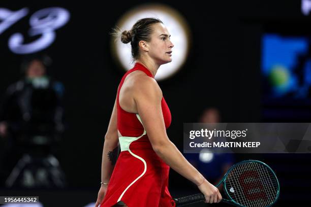Belarus' Aryna Sabalenka reacts on a point against China's Zheng Qinwen during their women's singles final match on day 14 of the Australian Open...
