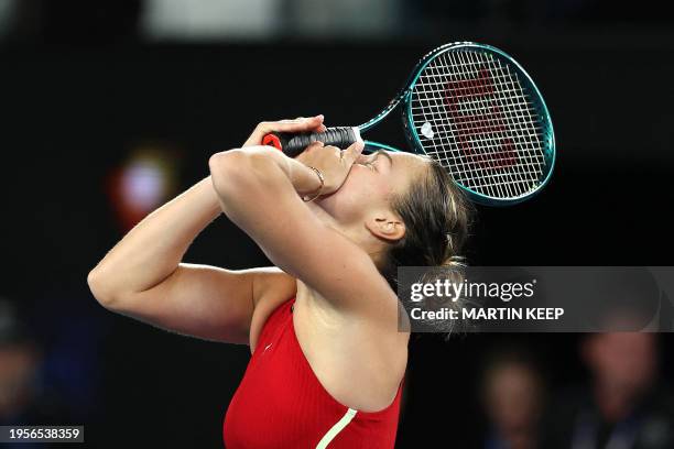 Belarus' Aryna Sabalenka celebrates victory against China's Zheng Qinwen during their women's singles final match on day 14 of the Australian Open...