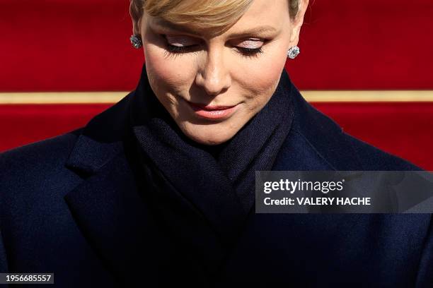 Princess Charlene of Monaco leaves the cathedral after taking part in the traditional festivities of Sainte Devote in the Principalty of Monaco on...