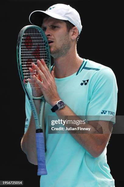 Hubert Hurkacz of Poland reacts during their quarterfinals singles match against Daniil Medvedev during the 2024 Australian Open at Melbourne Park on...