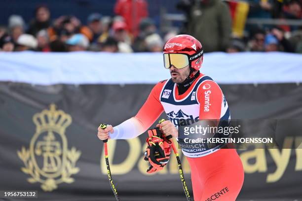 Switzerland's Loic Meillard reacts in the finish area during the men's Super G event of the FIS Alpine Skiing World Cup in Garmisch-Partenkirchen,...