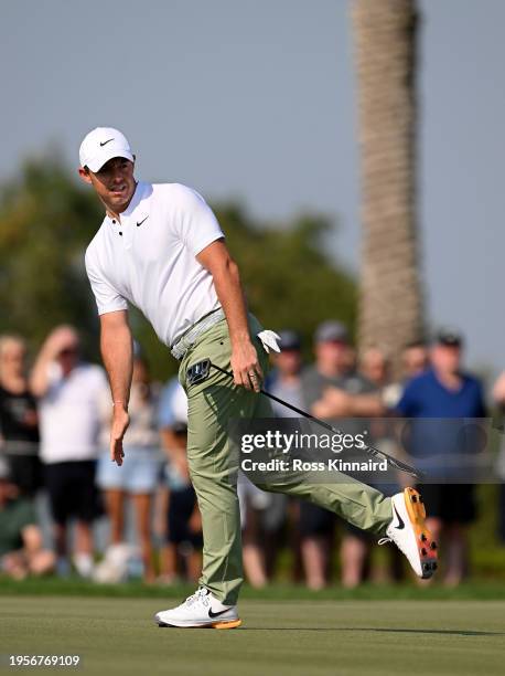 Rory McIlroy of Northern Ireland celebrates a birdie putt on the eighth green during the Final Round of the Hero Dubai Desert Classic at Emirates...