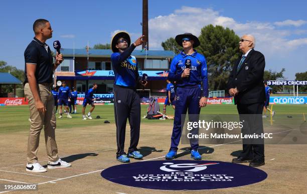 Sineth Jayawardena of Sri Lanka flips the coin as Alexander Volschenk of Namibia looks on ahead of the ICC U19 Men's Cricket World Cup South Africa...