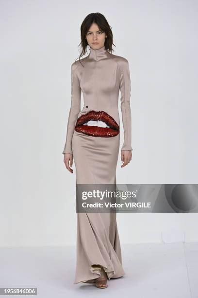 Model walks the runway during the Alexis Mabille Haute Couture Spring/Summer 2024 fashion show as part of Paris Fashion Week on January 23, 2024 in...