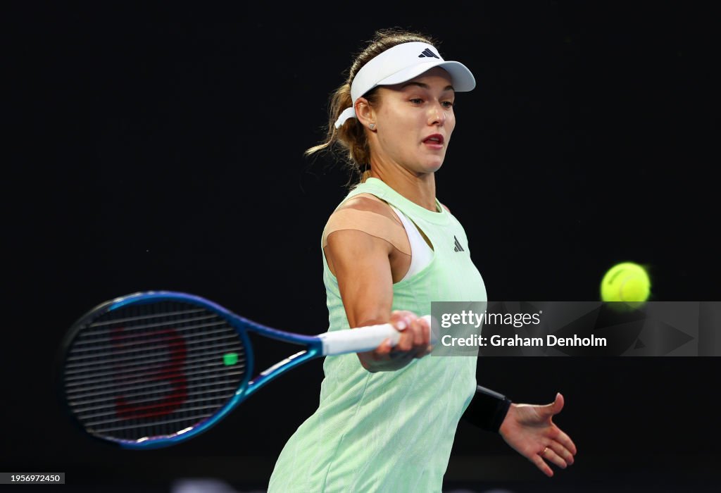 Anna Kalinskaya plays a forehand during their quarterfinals singles