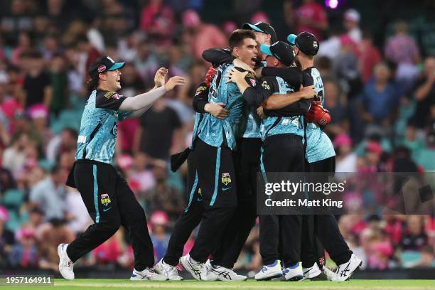 Brisbane Heat players celebrate victory during the BBL Final match between Sydney Sixers and Brisbane Heat at Sydney Cricket Ground, on January 24 in...