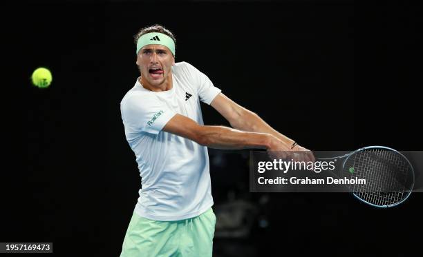 Alexander Zverev of Germany plays a backhand during their quarterfinals singles match against Carlos Alcaraz of Spain during the 2024 Australian Open...