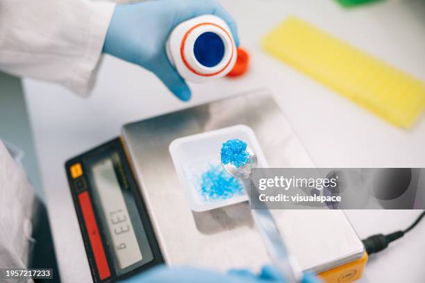 close up of female scientist working at the laboratory - laboratory scale stock pictures, royalty-free photos & images