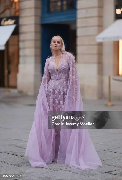 Palina Kozyrava seen wearing Natkina silver / pink diamond earrings, Rami Al Ali pastel lilac / purple embroidered belted transparent tulle long...