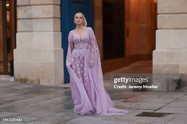 Palina Kozyrava seen wearing Natkina silver / pink diamond earrings, Rami Al Ali pastel lilac / purple embroidered belted transparent tulle long...