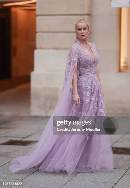 Palina Kozyrava seen wearing Natkina silver / pink diamond earrings, Rami Al Ali pastel lilac / purple embroidered belted transparent tulle long...