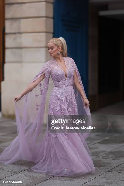 Palina Kozyrava seen wearing Natkina silver / pink diamond earrings, Rami Al Ali pastel lilac / purple embroidered belted transparent tulle long...