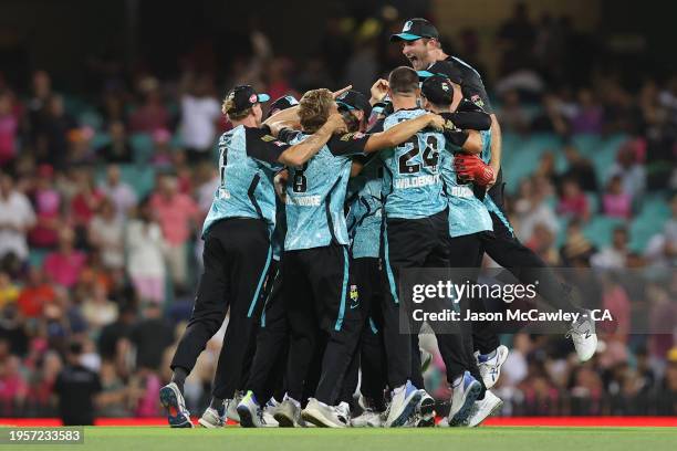 Brisbane Heat players celebrate victory during the BBL Final match between Sydney Sixers and Brisbane Heat at Sydney Cricket Ground, on January 24,...