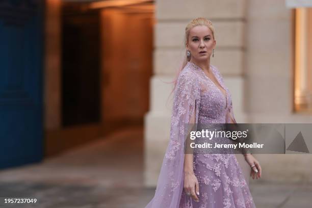 Palina Kozyrava seen wearing Natkina silver / pink diamond earrings, Rami Al Ali pastel lilac / purple embroidered belted transparent tulle long...