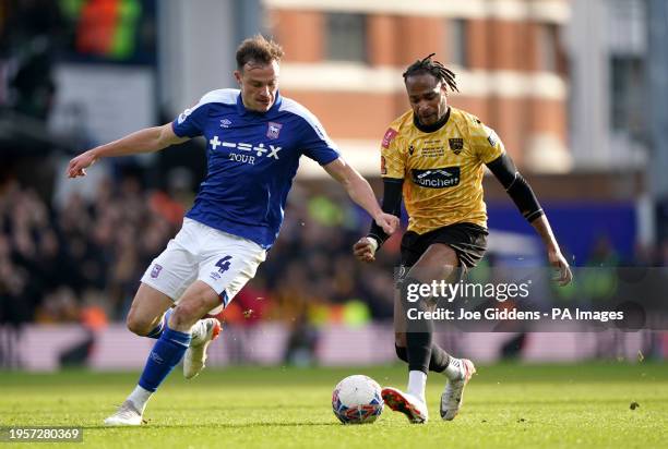 Ipswich Town's George Edmundson and Maidstone United's Lamar Reynolds battle for the ball during the Emirates FA Cup fourth round match at Portman...