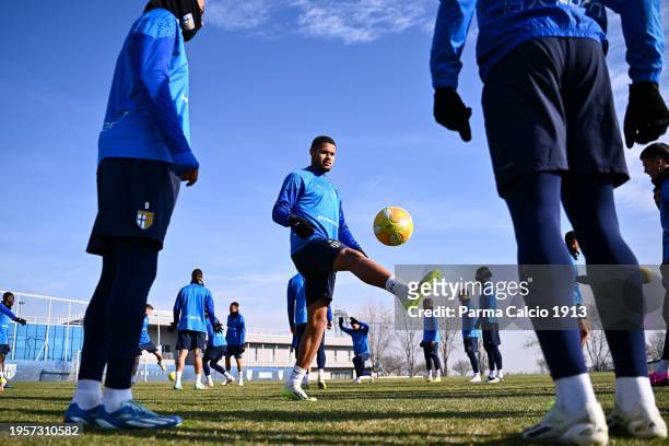 Simon Sohm kicks the ball during Parma Calcio training session at Mutti Training Center on January 24, 2024 in Collecchio, Italy.
