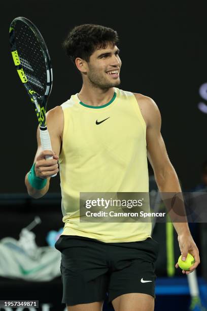 Carlos Alcaraz of Spain celebrates winning a game during their quarterfinals singles match against Alexander Zverev of Germany during the 2024...