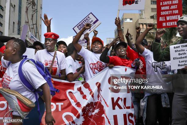 Activists gesture as they demonstrate in the Central Business District against an alarming rise in murders of young women in Nairobi on January 27,...