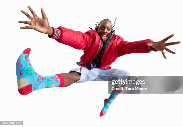 man jumping and reaching to camera - barefoot male stock pictures, royalty-free photos & images