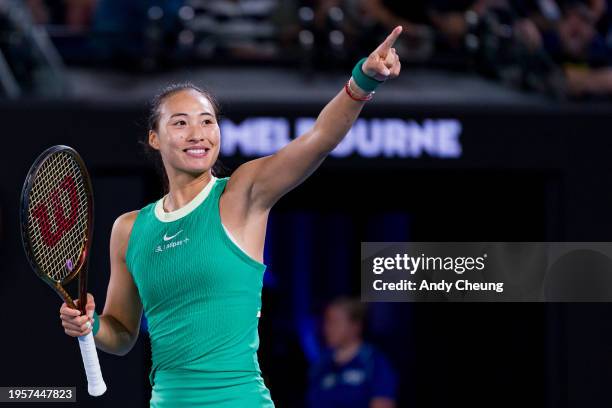 Qinwen Zheng of China celebrates winning match point during their quarterfinals singles match against Anna Kalinskaya during day eleven of the 2024...